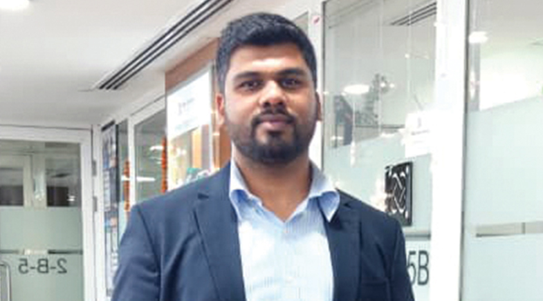 Robin Singh (left) and Chitranjan Singh, with CLUIX’s water quality  monitoring device (below)